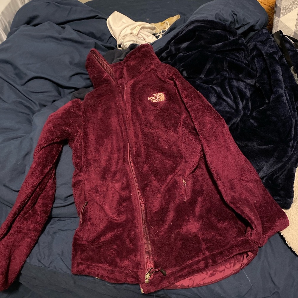 Purple/pink north face zip up.
